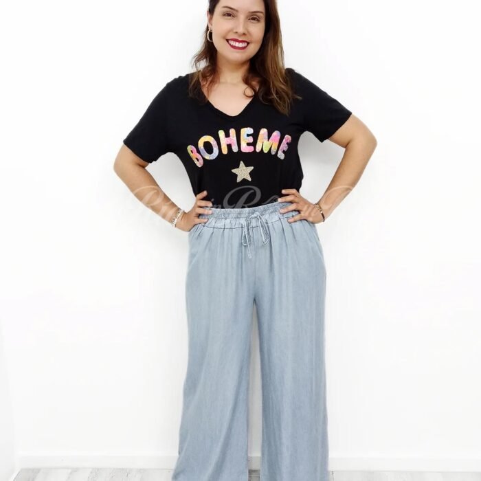 Calça pantalona plus size em tecido tipo ganga fina